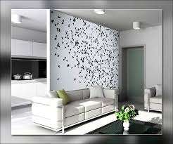 Des papillons ou des fleurs volumétriques aideront à raviver le mur, que vous pouvez faire vous-même par dessous