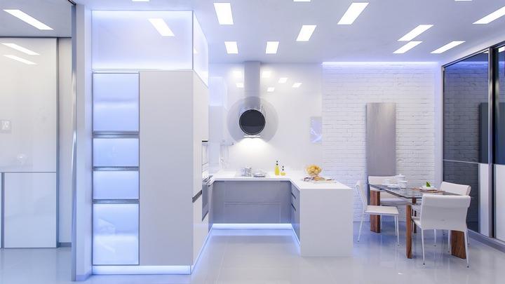 Culoarea albă a bucătăriei subliniază toată rafinamentul designului.